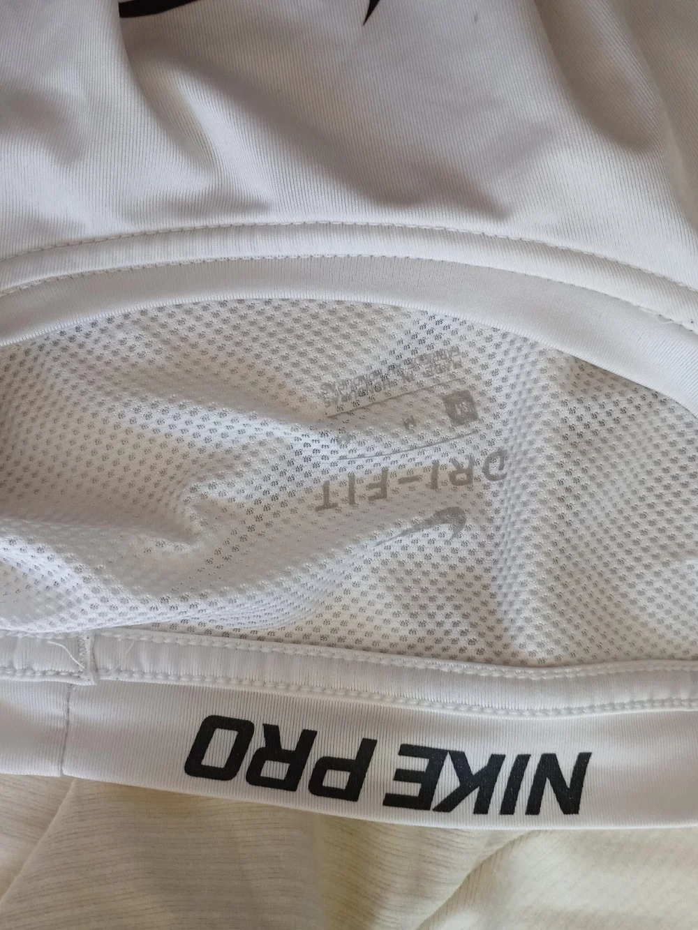 Nike White Athletic Tank Top with Black Swoosh